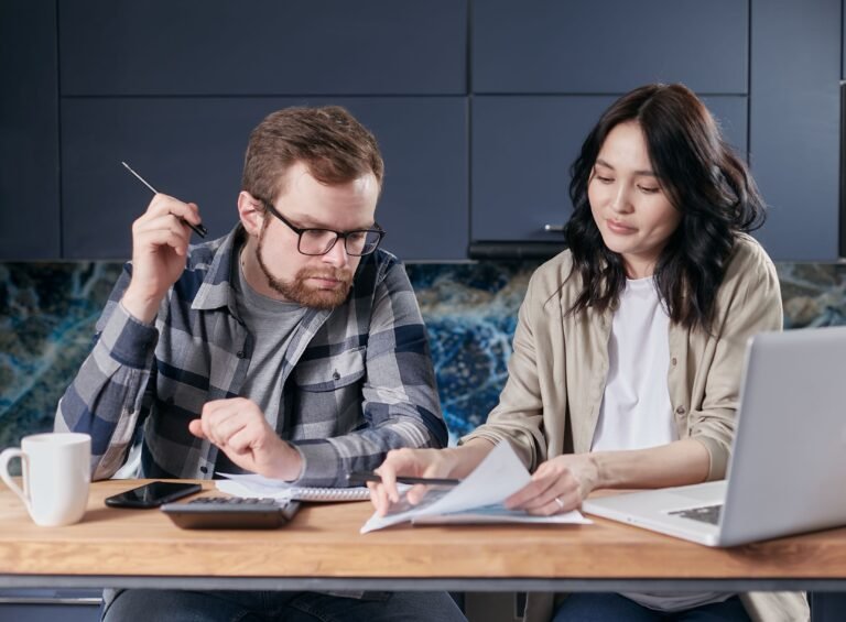 TaxDigit accountants reviewing a client's financial documents