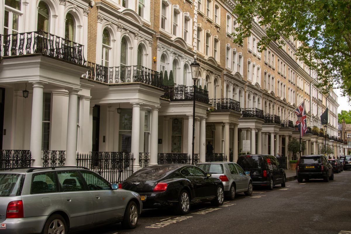 Georgian terraced houses with iron railings in London — buy-to-let property accounting, TaxDigit
