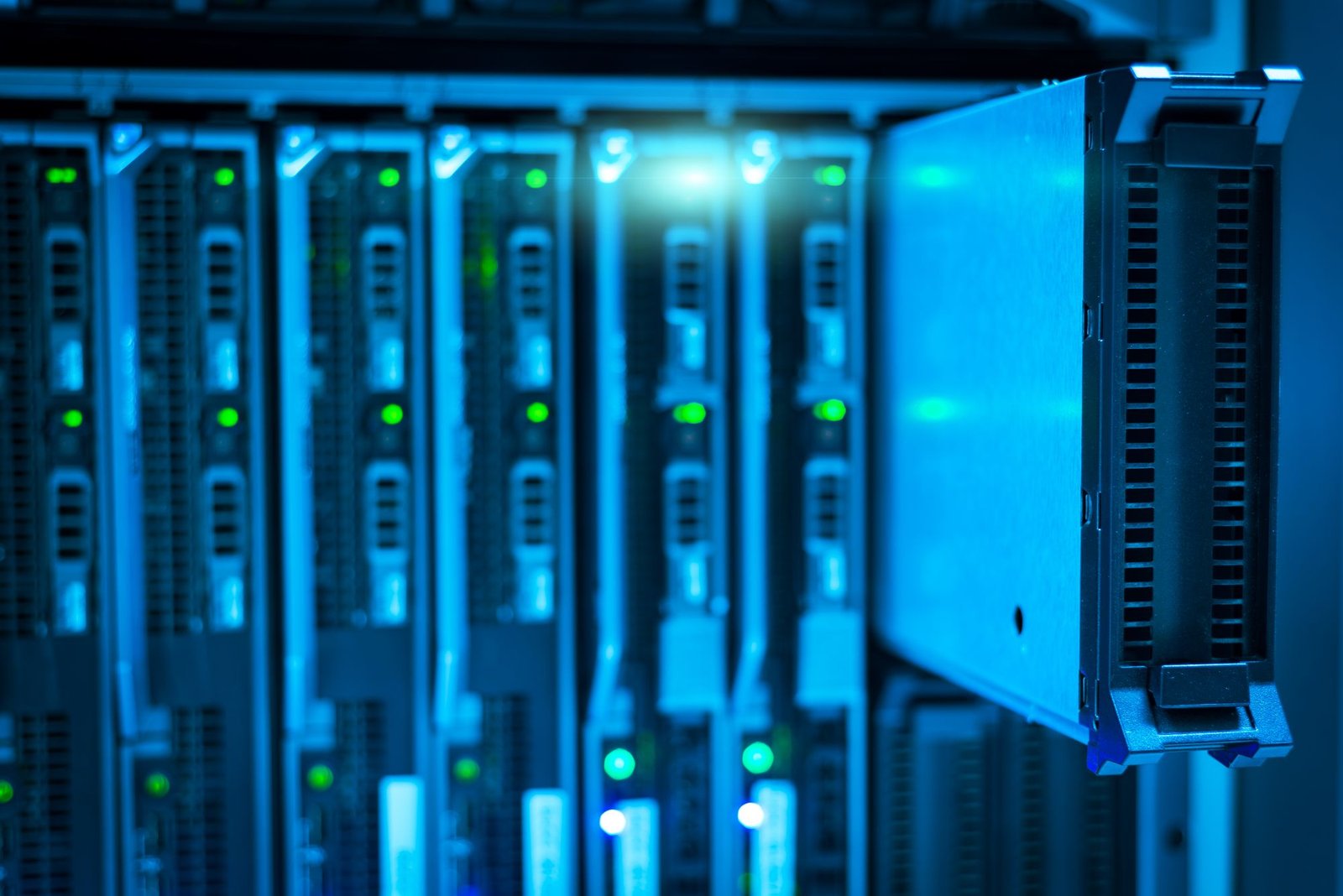 Illuminated server racks in a data centre, representing blockchain validators and staking infrastructure