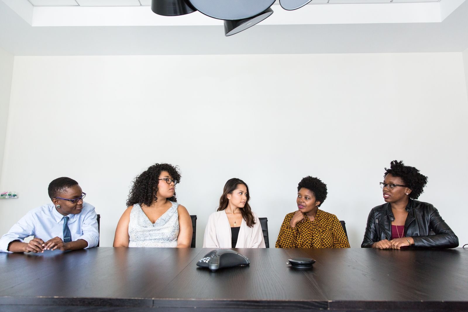 Team of professionals seated together in a bright office — TaxDigit Bengali accountancy services