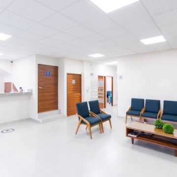 Reception and waiting area of a UK GP surgery