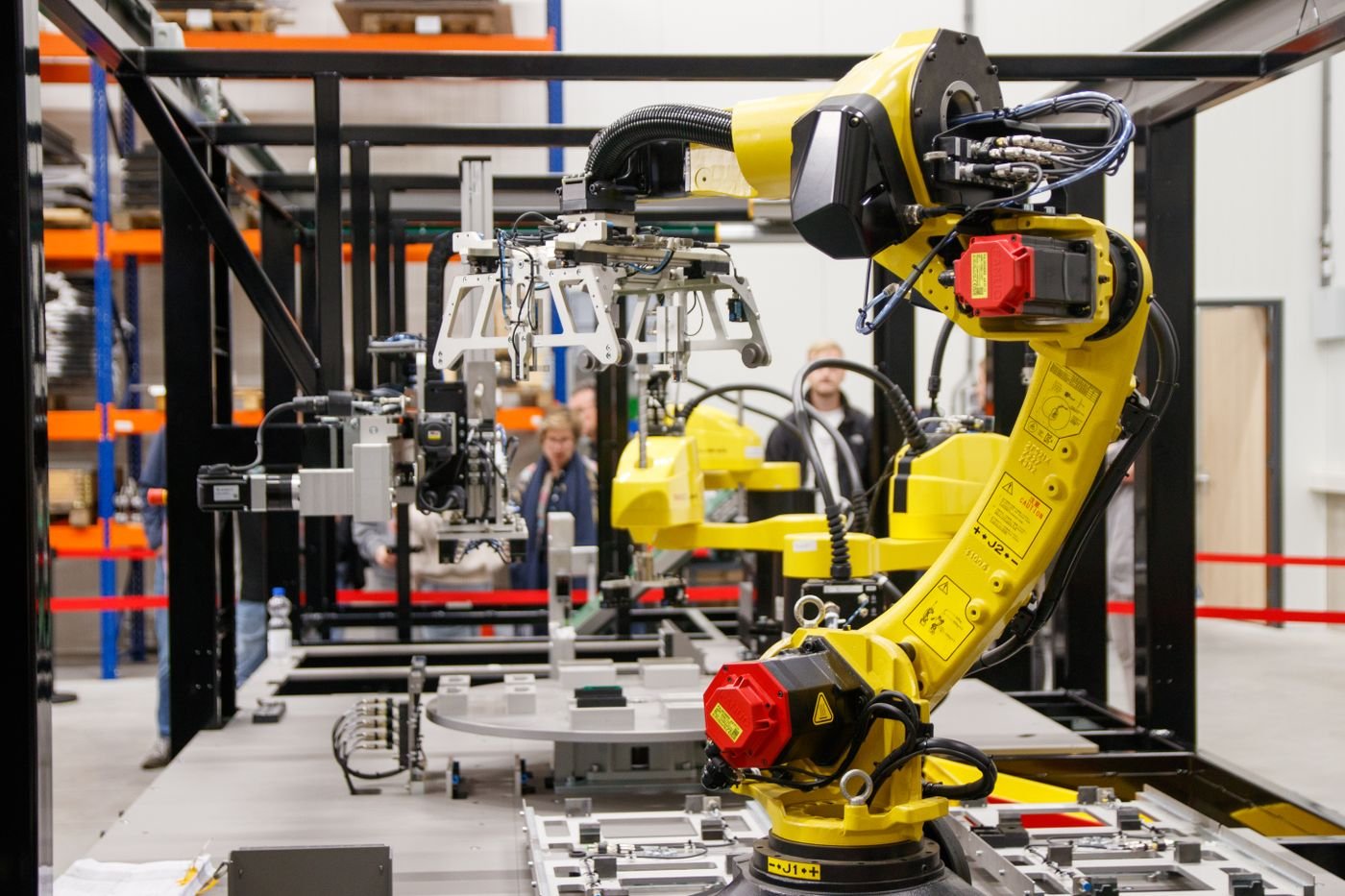 Industrial robot arm working on an automated production line