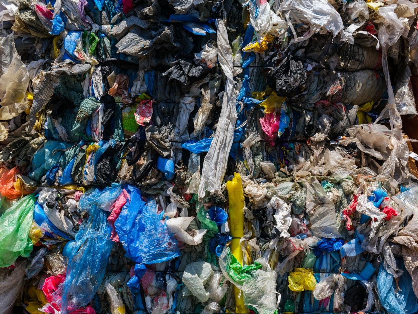 Sorted plastic material at a recycling centre ready for reprocessing