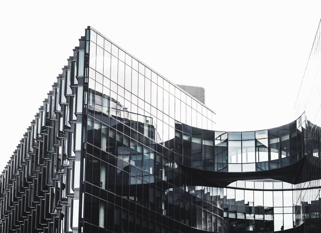 Modern glass office buildings in London, where many overseas companies base their first UK entity